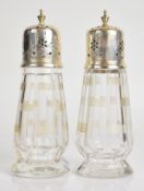Pair of Walker & Hall Art Deco hallmarked silver and cut glass sugar sifters, Sheffield 1921, height
