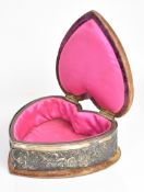 Victorian hallmarked silver heart shaped dressing table box or pin cushion with embossed decoration,