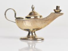 George V novelty hallmarked silver miniature table lighter formed as an oil lamp with snake