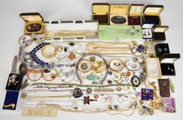 A collection of jewellery including Kate Spade bangle, mother of pearl necklace, four 9ct rolled