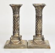 Pair of Victorian hallmarked silver Corinthian column candlesticks with wrythen stems and ram's head