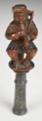 18th/19thC figural treen and white metal pipe tamper, with finely carved figure playing a clarinet /