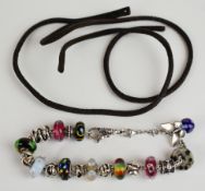 Silver Troll bead bracelet with nine silver charms and nine glass charms, 53g