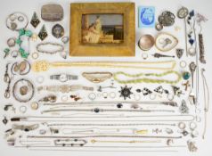 A collection of silver jewellery including filigree bracelet, gate bracelet, bamboo bangle,