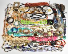 A collection of jewellery, necklaces including bone, amber and bone, beaded carnelian agate,