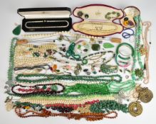 A collection of jewellery including coral earrings, necklaces including four beaded aventurine