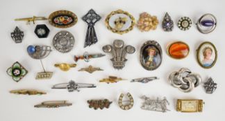 A collection of brooches including c1900 micro mosaic, two further micro mosaic, agate, horseshoe