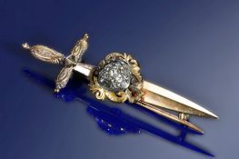Victorian yellow metal brooch in the form of a sword with heart mounted to the blade and set with