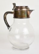Victorian hallmarked silver mounted lemonade jug, the hinged lid engraved with crest and motto 'hora