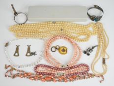 A collection of jewellery and silver including silver cigar piercer, silver christening bangle,