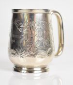 Victorian hallmarked silver tankard with engraved decoration of birds in the Aesthetic style,