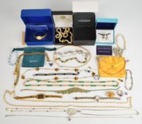 A collection of jewellery including silver earrings set with tanzanite, silver chain, silver pendant