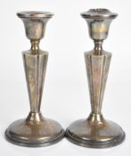 Pair of likely American silver candlesticks, marked to bases sterling, height 15.5cm