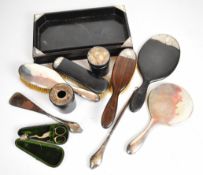 Hallmarked silver mounted ebony dressing table items to include tray, brushes and pots, three
