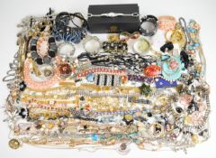 A collection of jewellery including Swarovski earrings, freshwater pearl bracelet, Bulova watch,