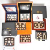 Four Royal Mint proof coin sets comprising 2000, two 2006, 2007, 2010 and two 2008, all in