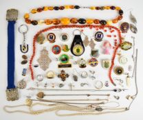 A collection of jewellery including Victorian brooch, Czech buckle, rolled gold locket, amber