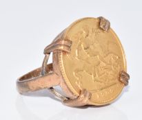 A 9ct gold ring set with a 1909 gold half sovereign, 7.7g, size J/K