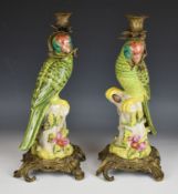 Pair of figural parrot candlesticks with metal mounts, H37cm