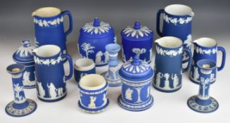 Wedgwood 19th and 20thC blue Jasperware jugs, candlesticks and preserve pots decorated with