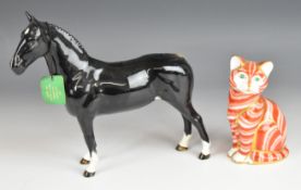 Beswick Black Hackney horse and a Royal Crown Derby cat paperweight, tallest 21cm