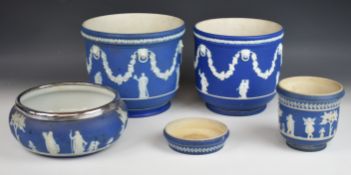 Wedgwood 19th and 20thC blue Jasperware jardinières, pedestal bowl and small dish, largest