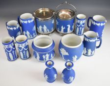 Wedgwood navy blue and lilac Jasperware including biscuit barrels, platters, jugs, vases etc,