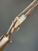 Browning 325 Grade 5 12 bore over and under ejector shotgun with gold inlaid dogs and birds to the
