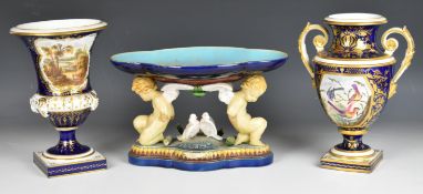 Bloor Derby and Crown Derby pedestal vases and a Majolica centrepiece, the tallest named to base 'On