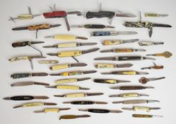 Approximately forty one various pocket knives, Swiss army knives etc, some commemorative souvenir