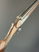 Gunmark Kestrel 20 bore side by side ejector shotgun with engraved scenes of birds to the locks