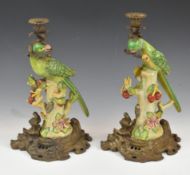 Pair of figural parrot candlesticks, H37cm