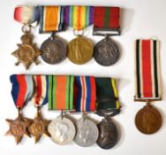Family medal groups comprising Arthur Edward Savigar's 'Tonypandy Riots' WW1 and police medal