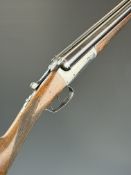 Cogswell & Harrison 20 bore side by side shotgun with named locks, chequered grip and forend, double