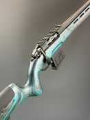 Sabatti Rover Varmint 6.5 Creedmoor bolt-action rifle with laminate show wood stock, semi-pistol