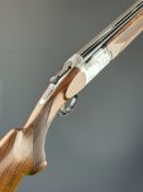 Beretta 682 Trap 12 bore over and under ejector shotgun with named action, underside and trigger
