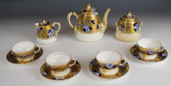 Late 19th/20thC Davenport tea for four with gilt and floral decoration, pattern no 4159, tallest