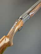 Perazzi MX7 12 bore over under ejector shotgun with chequered semi-pistol grip and forend, vented