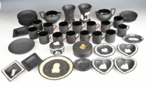 Forty five pieces of Wedgwood black basalt / Jasperware including trinket / pin dishes, coffee ware,