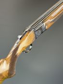Miroku 12 bore over and under ejector shotgun with engraved action, underside, trigger guard and