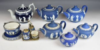 Wedgwood 19th and 20thC blue Jasperware teaware including four teapots and Copeland teapot, all