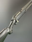 Tikka T3 .222 Remington bolt-action rifle with composite stock, textured semi-pistol grip and