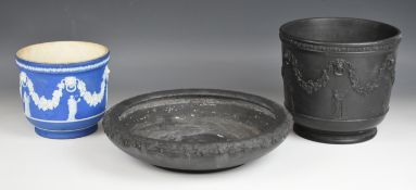 Wedgwood black basalt shallow bowl with leaf and vine decoration in relief, and two black and blue