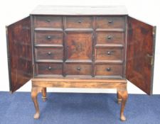 18thC continental olive wood, oak, mahogany and specimen wood parquetry cabinet on later stand,