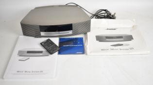 Two micro home Hi-Fi systems comprising Bose Wave III and Cambridge Audio DX1.