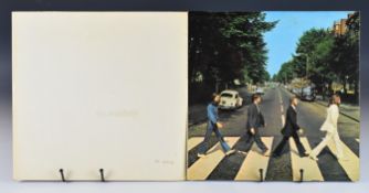 Two Beatles LPs comprising 'White Album' (PCS 7068) with top opening numbered 0405467 sleeve,