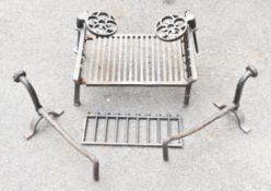 Cast metal fire grate with two trivets and fire dogs, W50cm