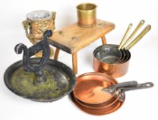18thC elm stool, graduated copper pans, boot scraper, cast metal jardinière with figural decoration