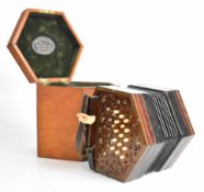 Lachenal & Co thirty one button Anglo system concertina with wooden fretwork ends, late 19th or