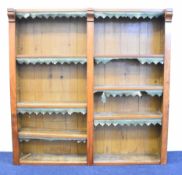 19thC stained pine and mahogany bookcase with adjustable dog tooth shelves and tooled leather